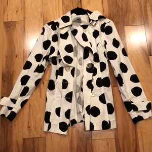 Black and white polka dot raincoat